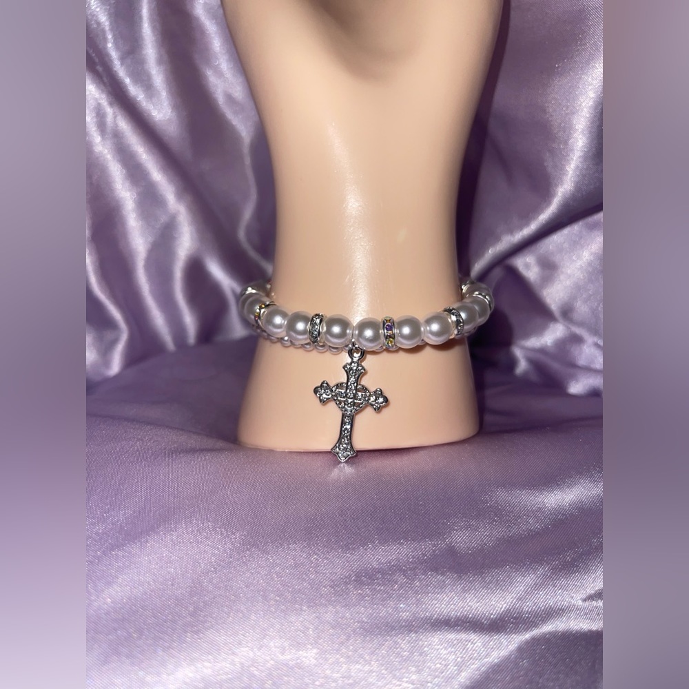 Pearls and cross charm bracelet